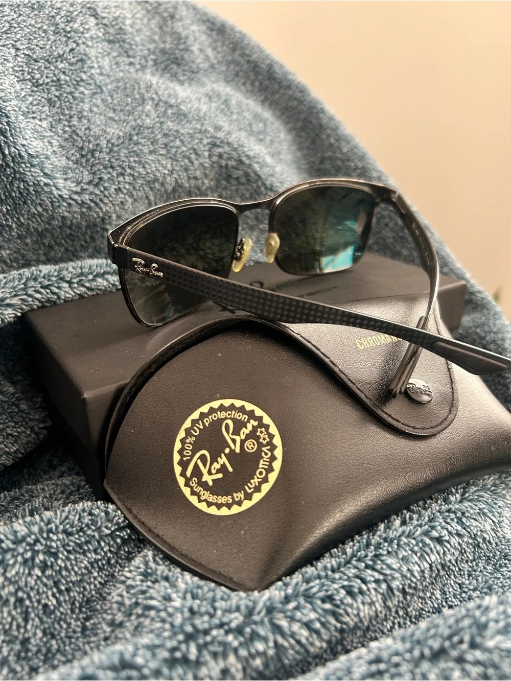Ray-Ban Black Sunglasses with Silver Lenses
